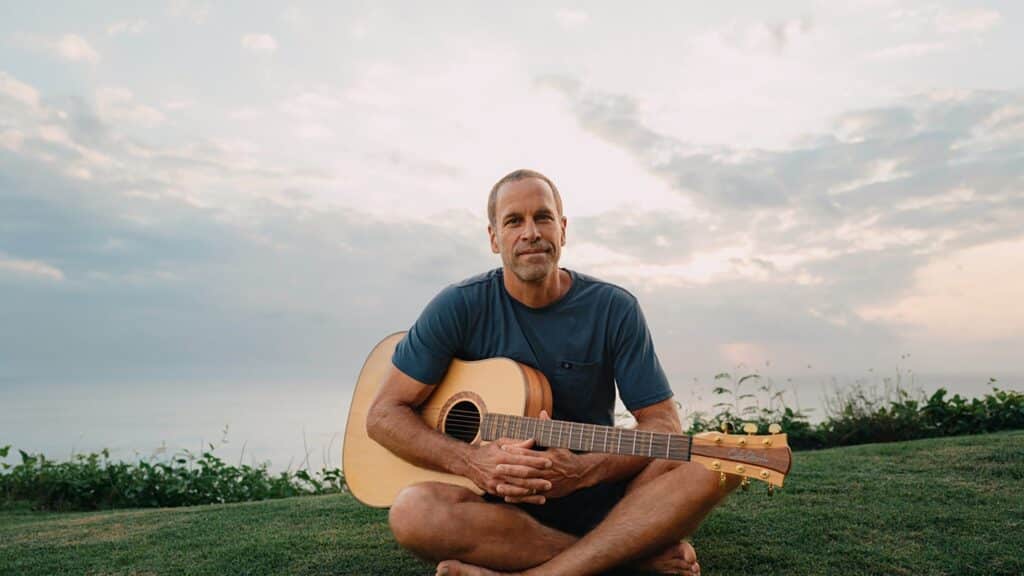Jack Johnson performing on stage during the SURFILMUSIC Tour 2026 at Morton Amphitheater.