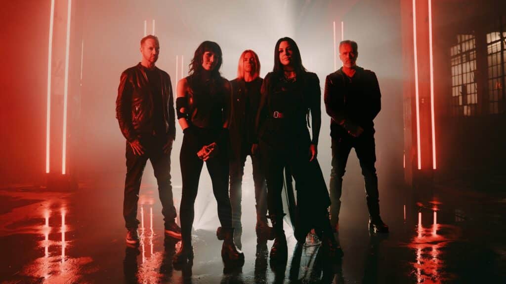 Evanescence 2026 World Tour promotional image featuring the band performing live on stage.