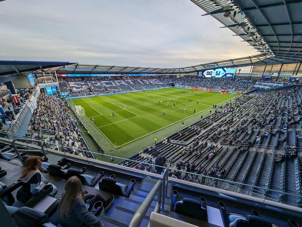 Sporting Park stadium with fans cheering during a game in Kansas City.