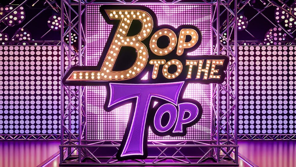 A vibrant flyer for the Bop To The Top dance event featuring colorful graphics and the Uptown Theater in the background.